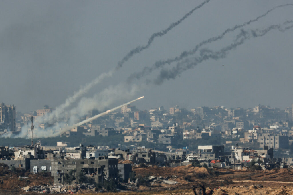 Rockets are launched from the Gaza Strip into Israel, after a temporary truce expired between Israel and the Palestinian Islamist group Hamas, as seen from Israel's border with Gaza in southern Israel, on 1st December, 2023