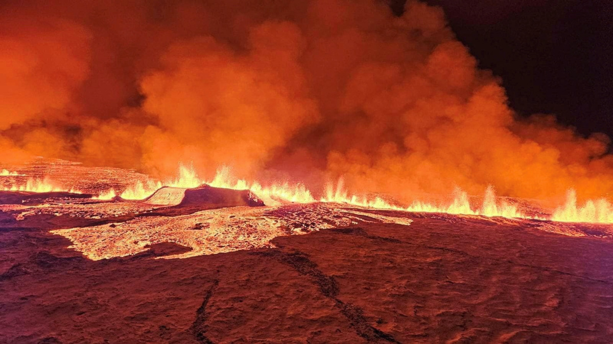 A volcano spews lava and smoke as it erupts in Grindavik, Iceland, on 18th December, 2023. 