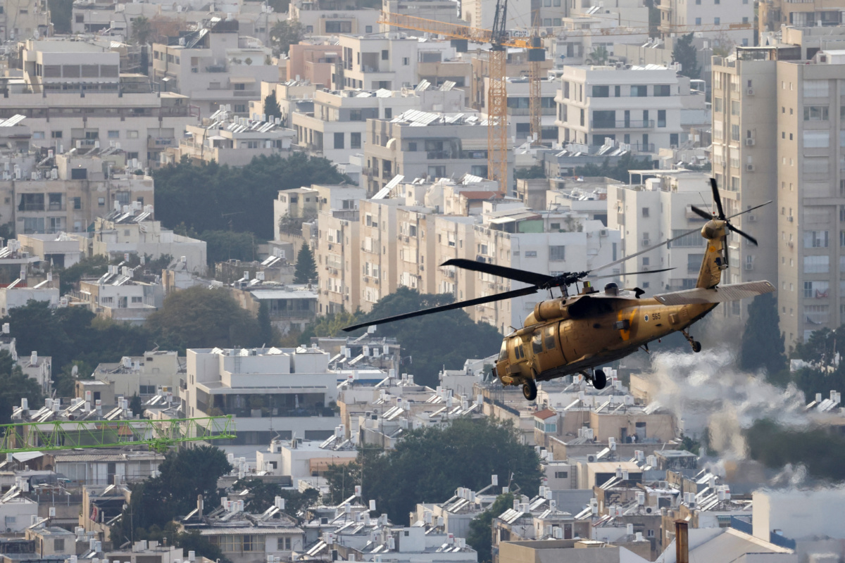 A military helicopter flies over Tel Aviv after lifting off from the Tel Aviv Sourasky Medical Center, amid the ongoing conflict between Israel and the Palestinian Islamist group Hamas, Israel, on 27th December, 2023.