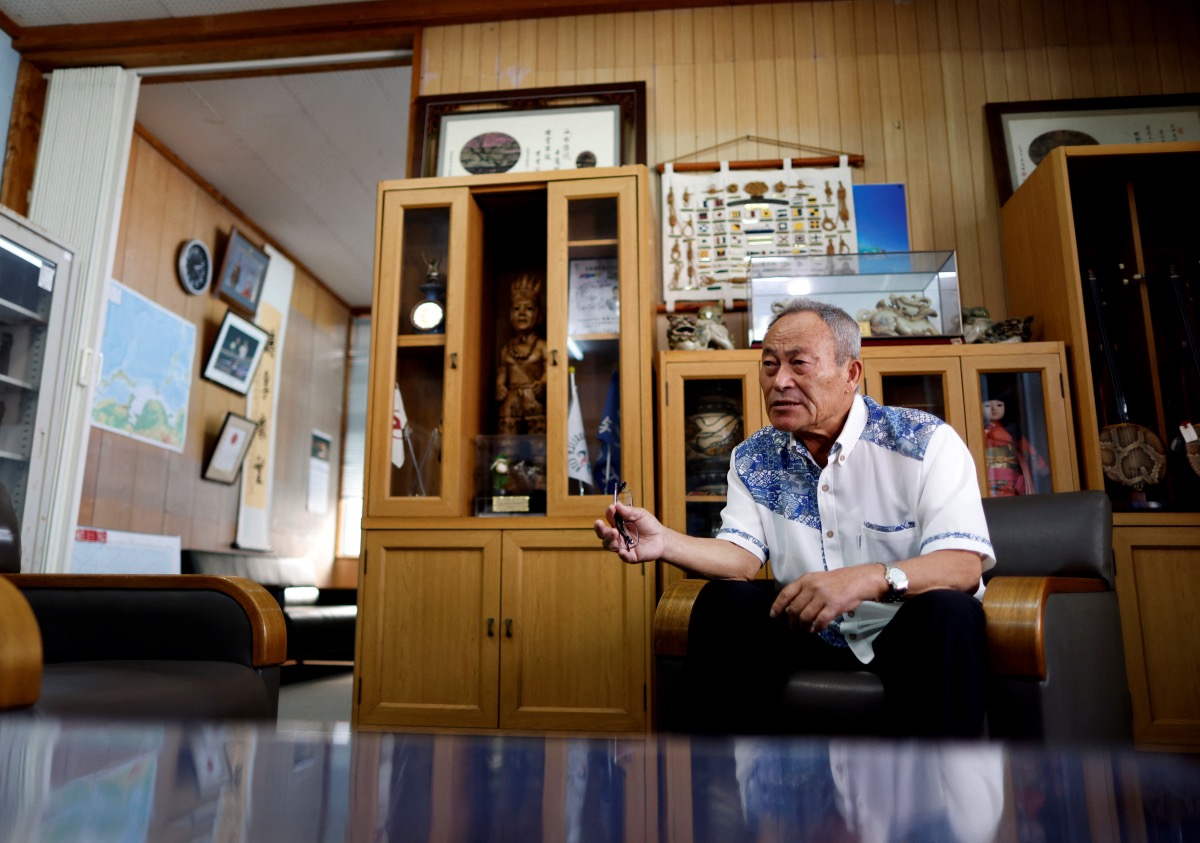 Yonaguni town mayor Kenichi Itokazu speaks during an interview with Reuters at Yonaguni town hall, on Yonaguni island, Japan's westernmost inhabited island in Okinawa prefecture, Japan, on 9th November, 2023