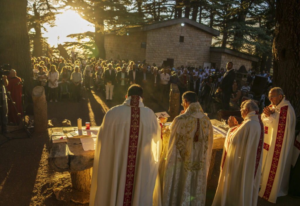 Lebanese Maronite Christian Patriarch Beshara al-Rai, second left, leads the sermon to commemorate the Feast of the Transfiguration in the Cedars of God forest, in the north-east mountain town of Bcharre, Lebanon, on Saturday, 5th August, 2023