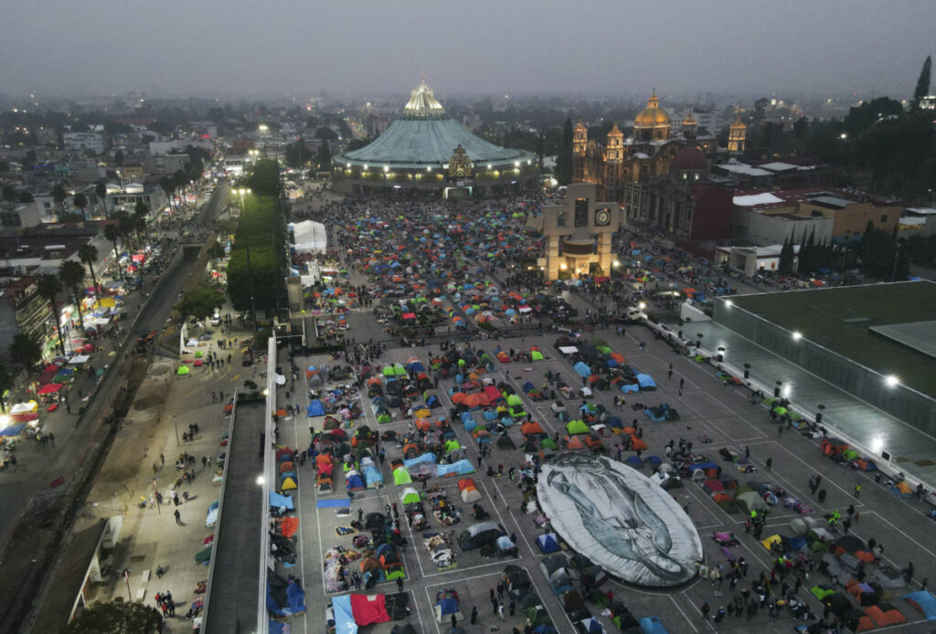Pilgrims sleep outside the Basilica of Guadalupe on her feast day in Mexico City, early on Tuesday, 12th December, 2023.