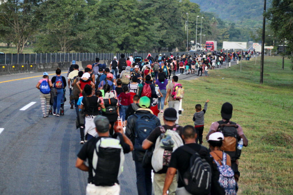 Migrants continue walking in a caravan in an attempt to reach the US border, in Escuintla, Mexico, on 28th December, 2023