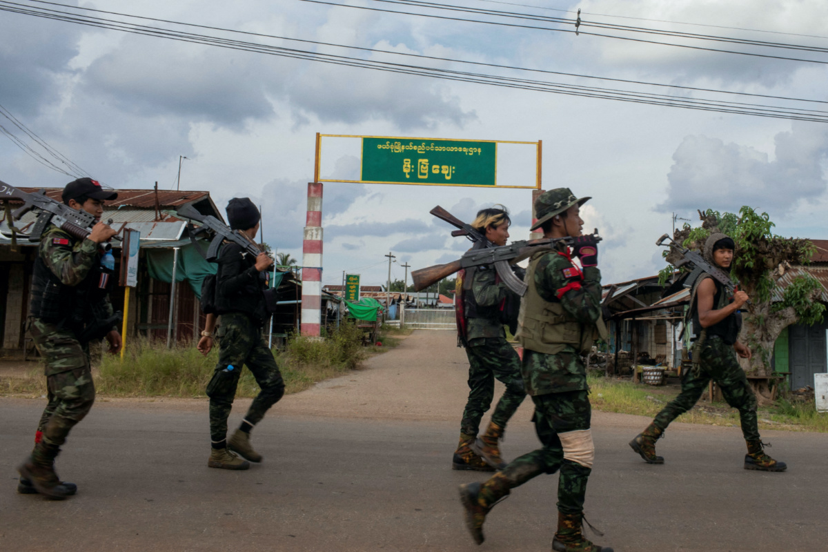 Volunteer members of Karenni insurgent forces walk in Moe Bye in Kayah State, Myanmar on 12th November, 2023. 