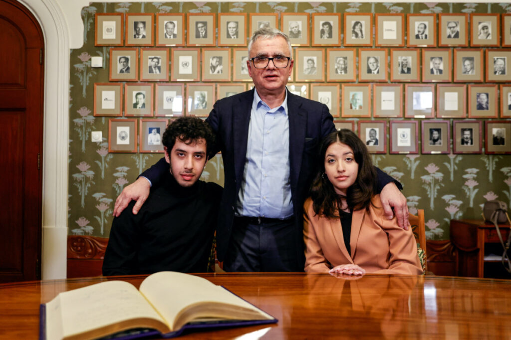 The husband and children of this year's winner of the Nobel Peace Prize, Ali, Taghi and Kiana Rahmani pose for pictures after signing the guest book at the Nobel Institute in Oslo, Norway, on 9th December, 2023.
