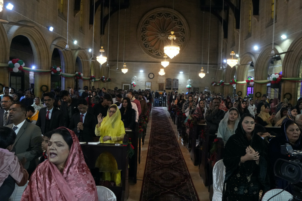Christians attend midnight Christmas mass at St Andrew's Church in Karachi, Pakistan, on Sunday, 24th December, 2023.