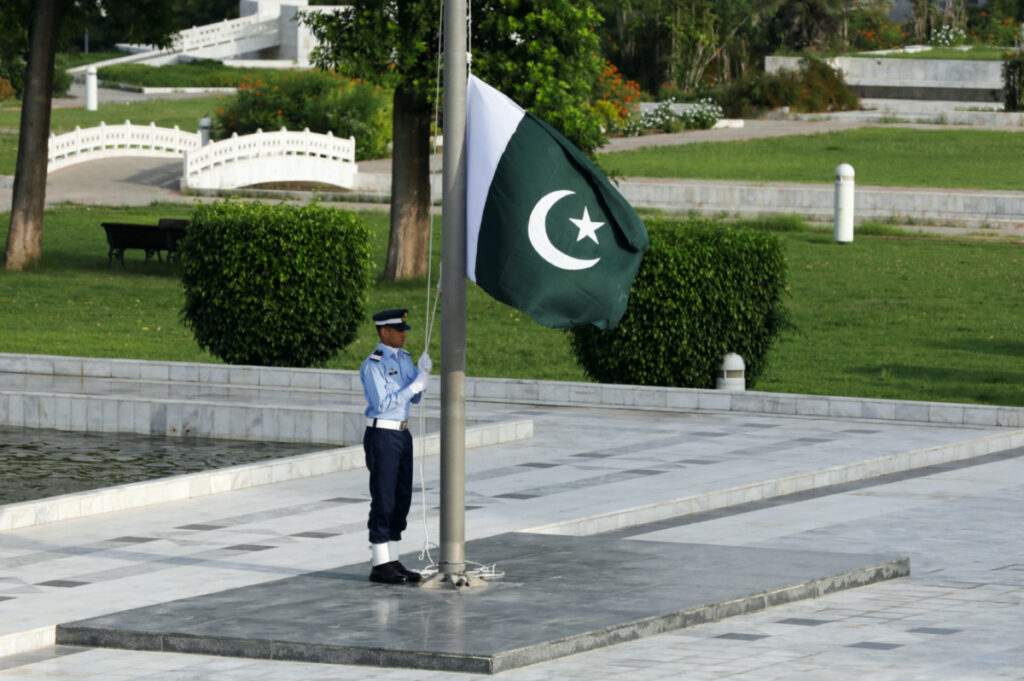 A member of the Pakistan Air Force rehearses flag masting at the mausoleum of Muhammad Ali Jinnah before the Defence Day ceremonies, or Pakistan's Memorial Day, in Karachi, Pakistan on 6th September, 2020
