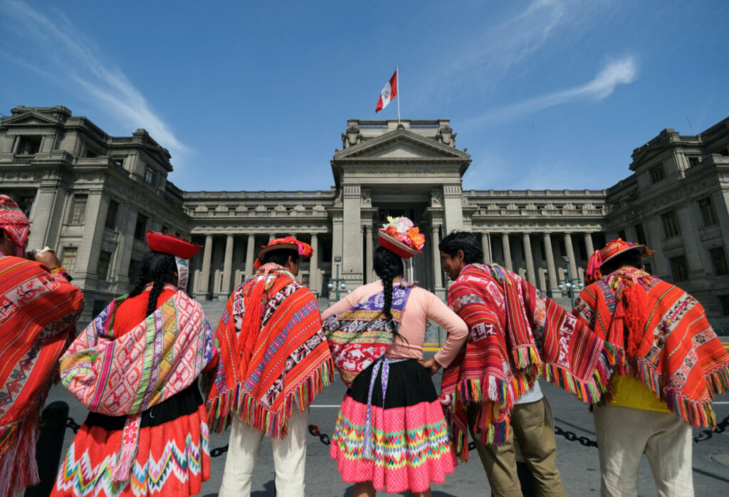 Members of a delegation from Ollantaytambo stand outside the court of justice before joining the protests against Peru's President Dina Boluarte, in Lima, Peru on 26th January, 2023