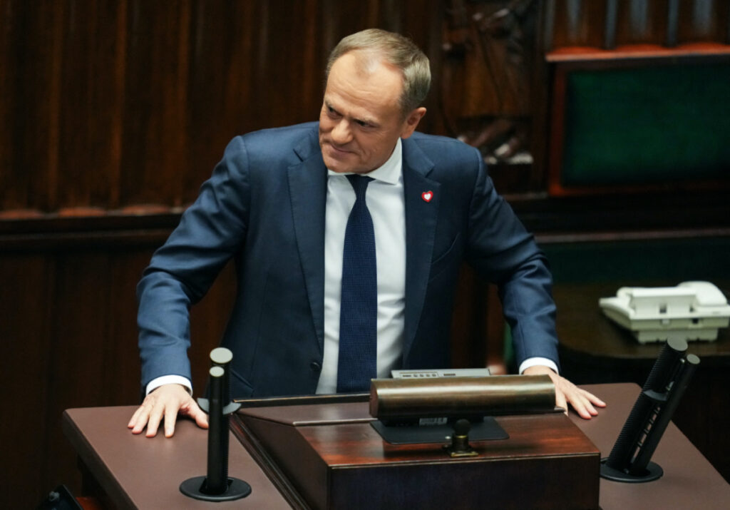 Leader of the Civic Coalition Donald Tusk looks to his right after the Parliament voted in favor of him becoming the Prime Minister, in Parliament, in Warsaw, Poland, on 11th December, 2023.