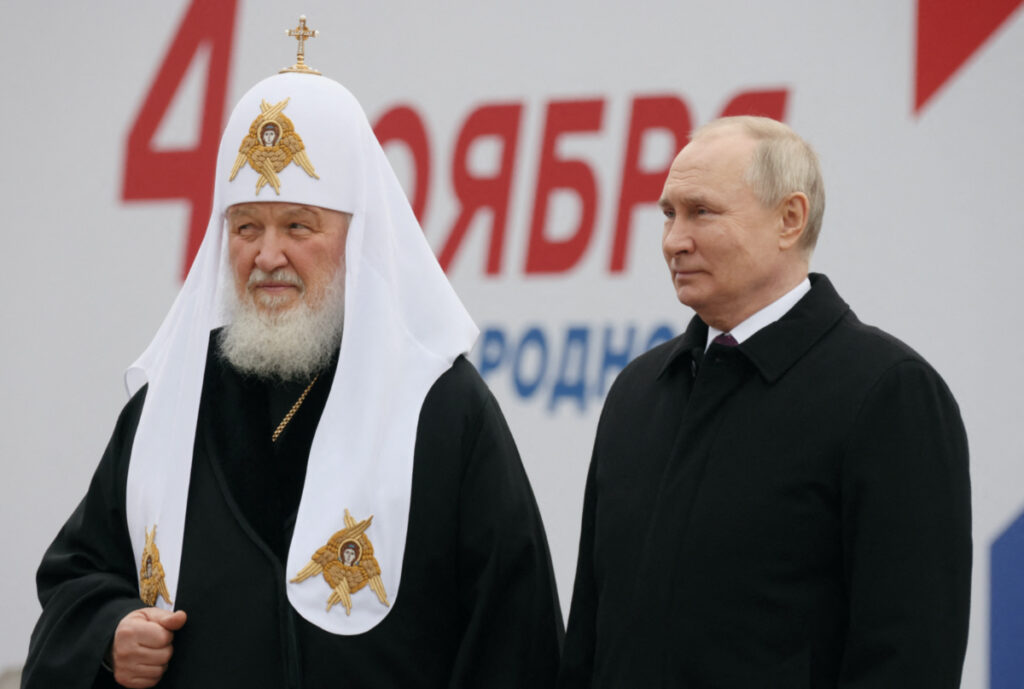 Russian President Vladimir Putin and Patriarch Kirill of Moscow and All Russia take part in a flower-laying ceremony at the monument to Kuzma Minin and Dmitry Pozharsky while marking Russia's Day of National Unity in Red Square in central Moscow, Russia, on 4th November, 2023.