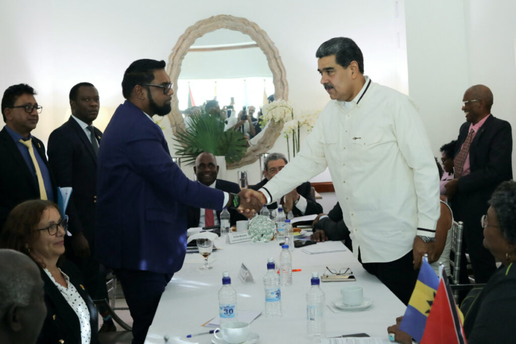 Venezuela's President Nicolas Maduro and Guyanese President Irfaan Ali shake hands as they meet amid tensions over a border dispute, in Kingstown, St. Vincent and the Grenadines on 14th December, 2023