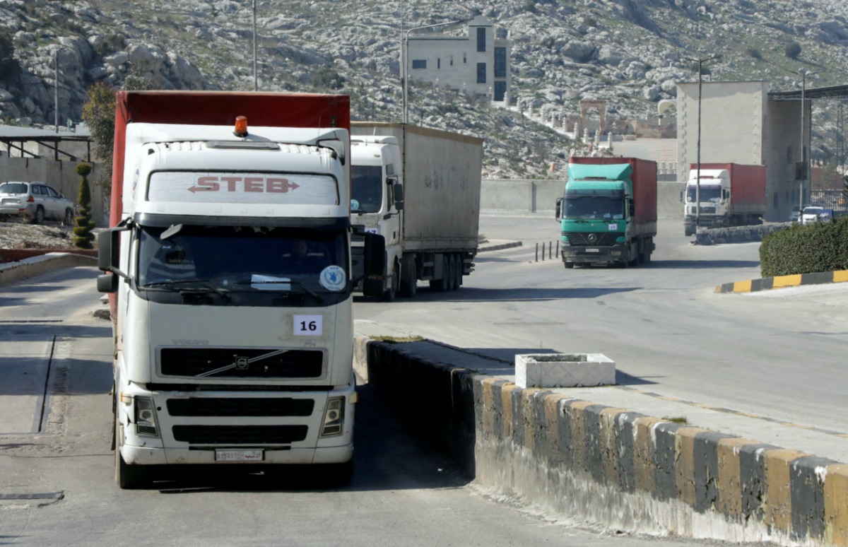 A convoy of trucks carrying aid from UN World Food Programme, following a deadly earthquake, enters Bab al-Hawa crossing, Syria, on 20th February, 2023.