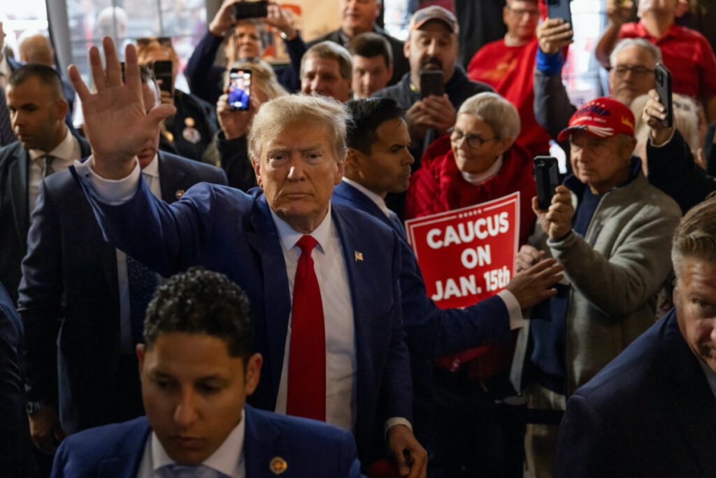 Former US President and Republican presidential candidate Donald Trump rallies with supporters at a "commit to caucus" event at a Whiskey bar in Ankeny, Iowa, US, on 2nd December, 2023