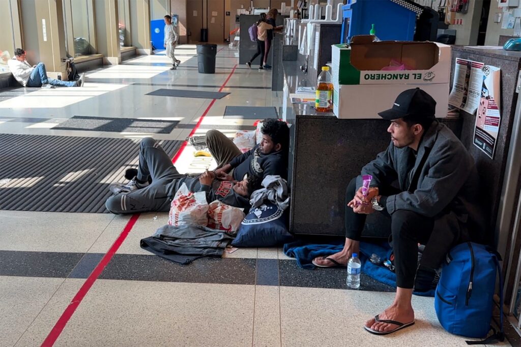 Migrants, without a place to stay upon arrival in the city, seek safe shelter inside the District 12 station of the Chicago Police Department in Chicago, Illinois, US, on 17th May, 2023