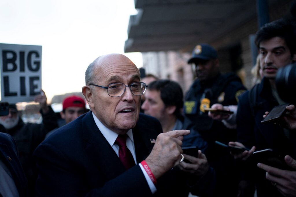 Former New York Mayor Rudy Giuliani departs the US District Courthouse after he was ordered to pay $US148 million in his defamation case in Washington, US, on 15th December, 2023