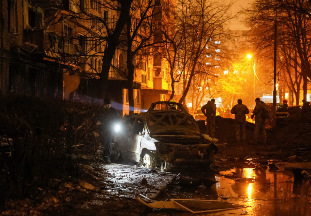 Emergency staff work at a site of an apartment building damaged during a Russian missile strike, amid Russia's attack on Ukraine, in Kyiv, Ukraine, on 13th December, 2023.