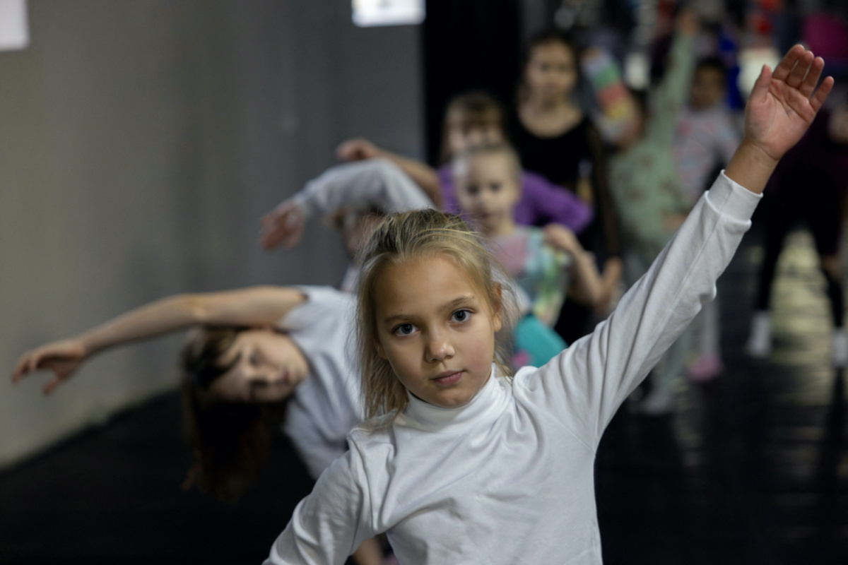 Angelina Bondarenko, 8, attends a gymnastics class in Sloviansk, amid Russia's attack on Ukraine, on 19th December, 2023