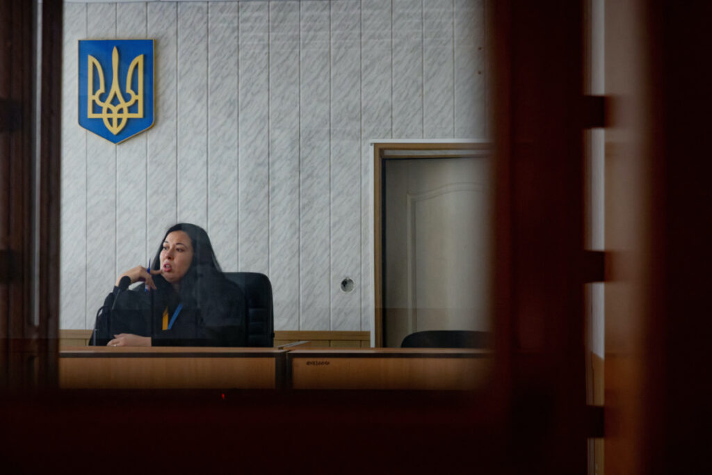 Judge Olha Konoplenko presides over a hearing, to which defendants and plaintiffs dial in remotely, in a courthouse in a town near the front line, in the Donetsk region, amid Russia’s attack on Ukraine, on 13th December, 2023