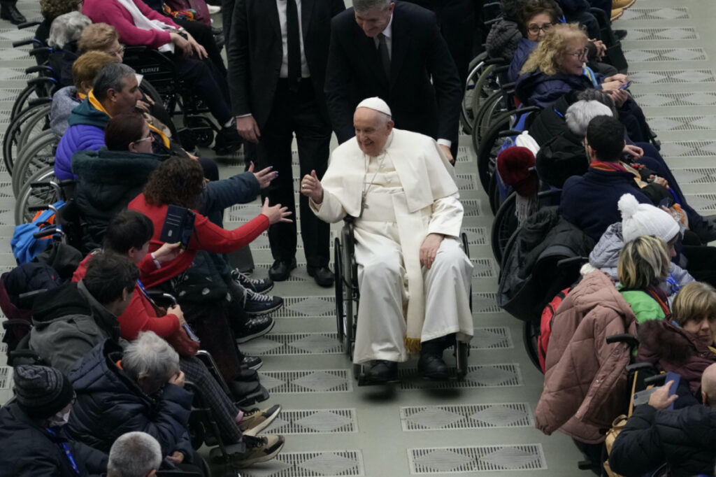 Pope Francis leaves after an audience with sick people and Lourdes pilgrimage operators in the Paul VI Hall, at the Vatican, on Thursday, 14th December, 2023
