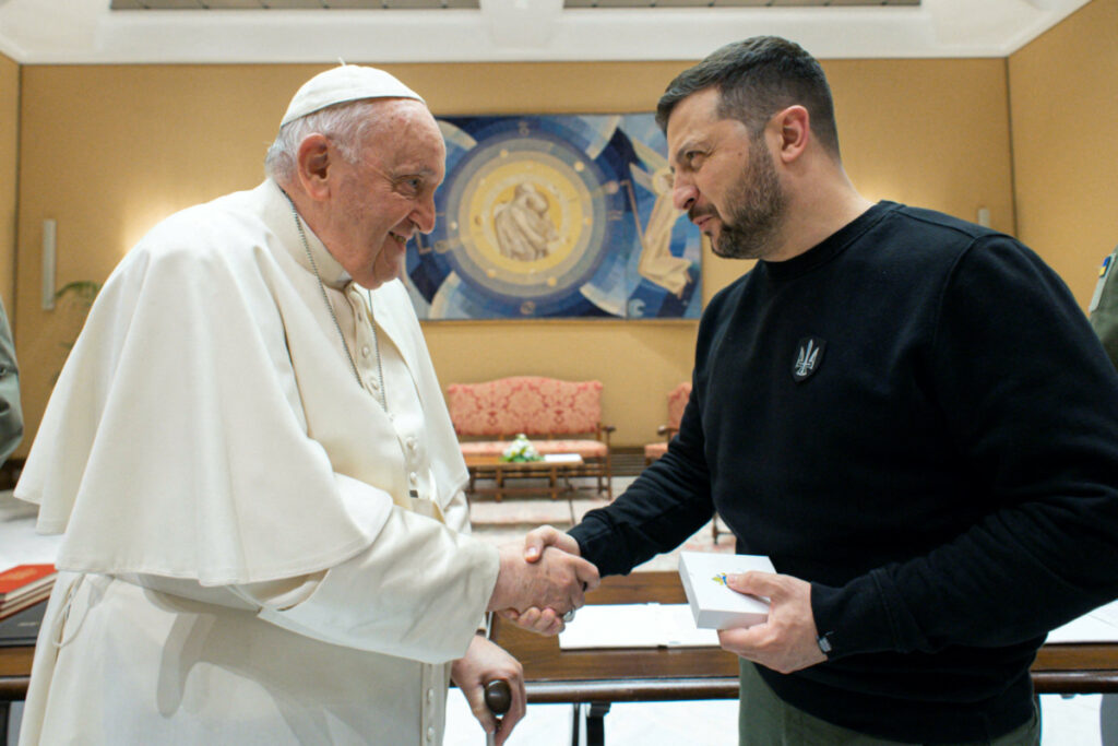 Pope Francis shakes hands with Ukrainian President Volodymyr Zelenskiy, at the Vatican, on 13th May, 2023