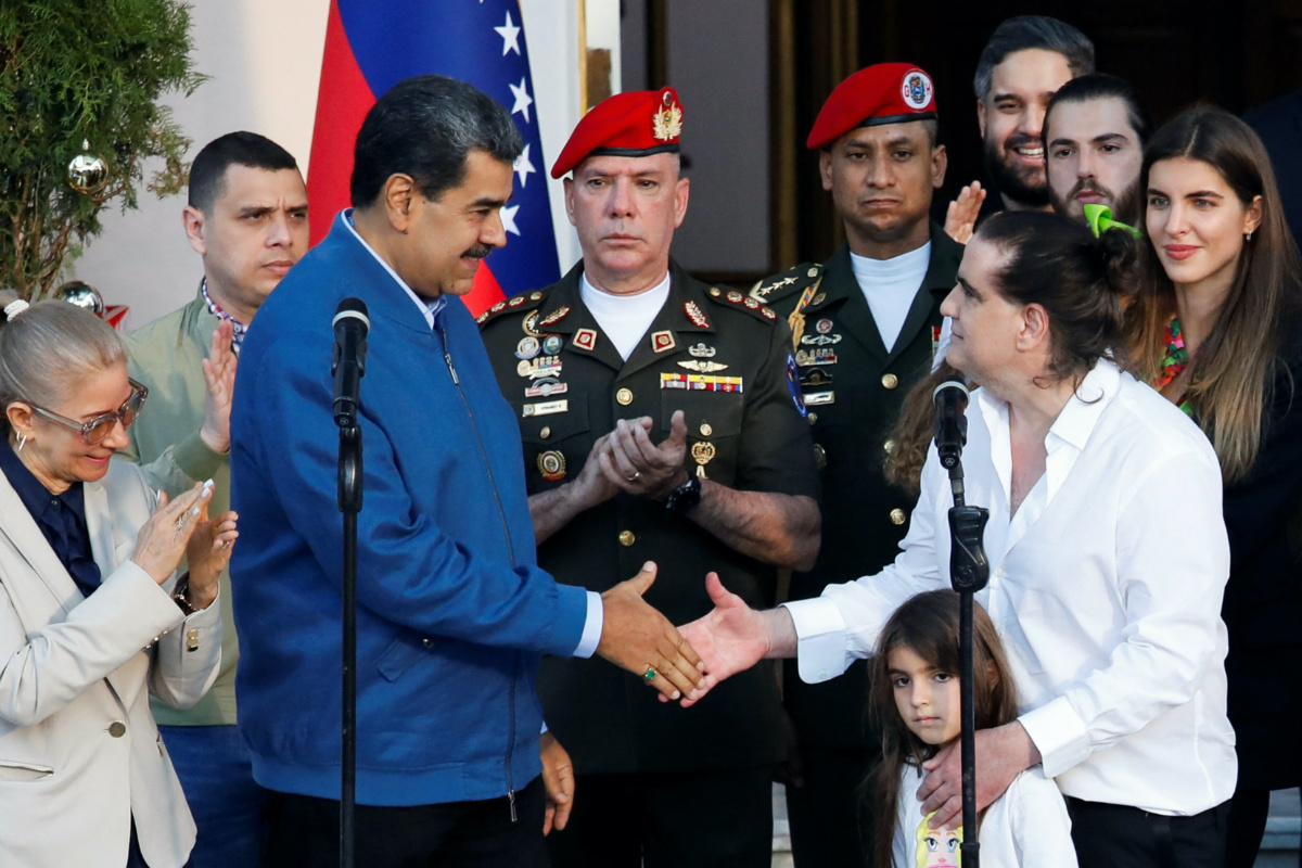 Venezuelan President Nicolas Maduro shakes hands with Alex Saab, who was facing US bribery charges, after he was released by the US Government, at the Miraflores Palace, in Caracas, Venezuela, on 20th December, 2023
