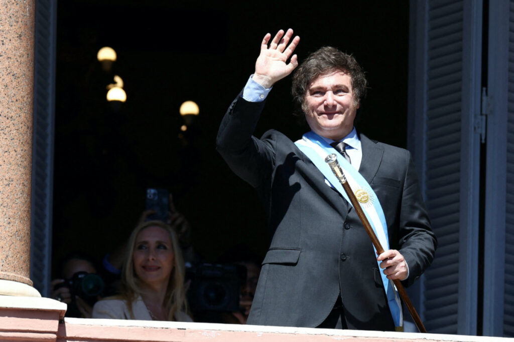 Argentina's President Javier Milei waves to supporters from the Casa Rosada balcony, as his sister Karina Milei looks on, after his swearing-in ceremony, in Buenos Aires, Argentina on 10th December, 2023