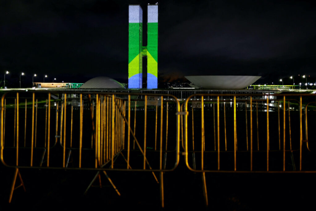 Brazil's flag is projected on the building of the National Congress as part of events to mark the consolidation of democracy in Brazil, a year after supporters of far-right former President Jair Bolsonaro stormed the presidential palace, Congress and Supreme Court on 8th January, 2023, in Brasilia, Brazil on 7th January, 2024.