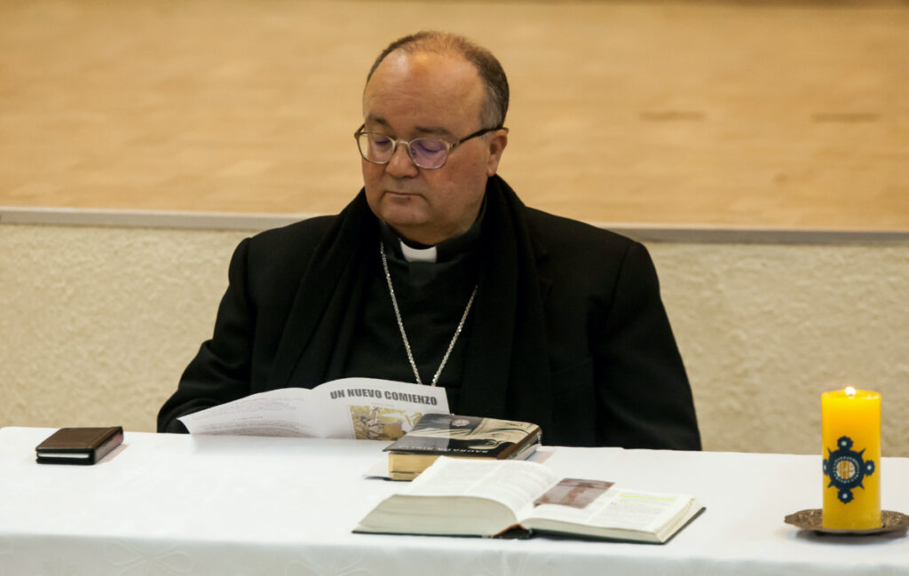 Special Vatican envoys, archbishop Charles Scicluna reads a brochure entitled "A new beginning", during a meeting with priests inside a church in Osorno, Chile, on 15th June, 2018.