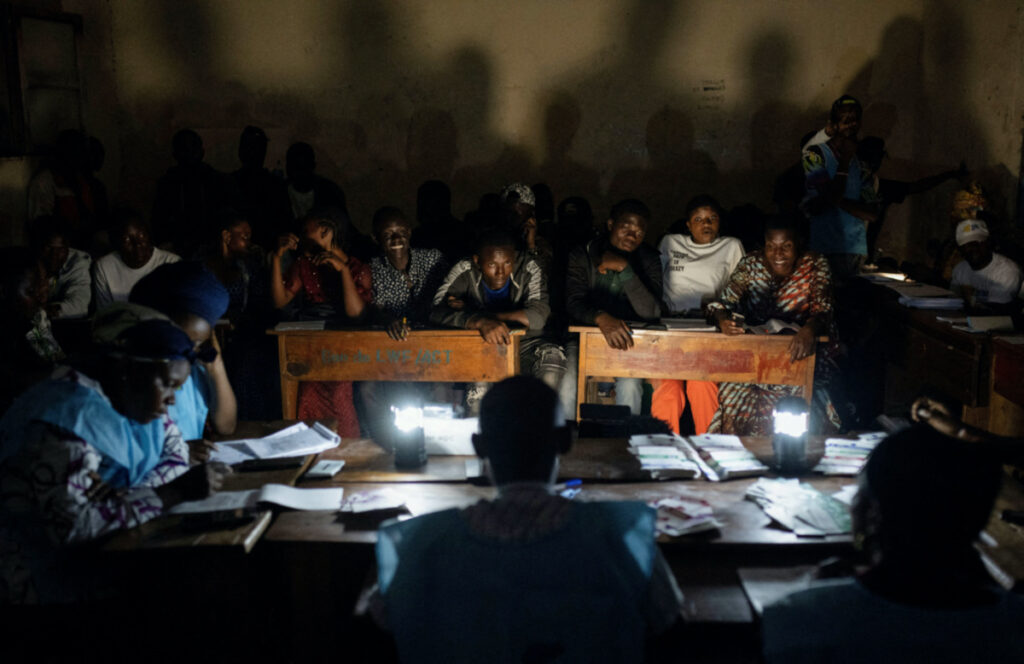 Independent National Electoral Commission officials and polling agents gather to count and tally casted ballot papers at a polling centre following the Presidential election in Goma, North Kivu province of the Democratic Republic of Congo on 20th December, 2023