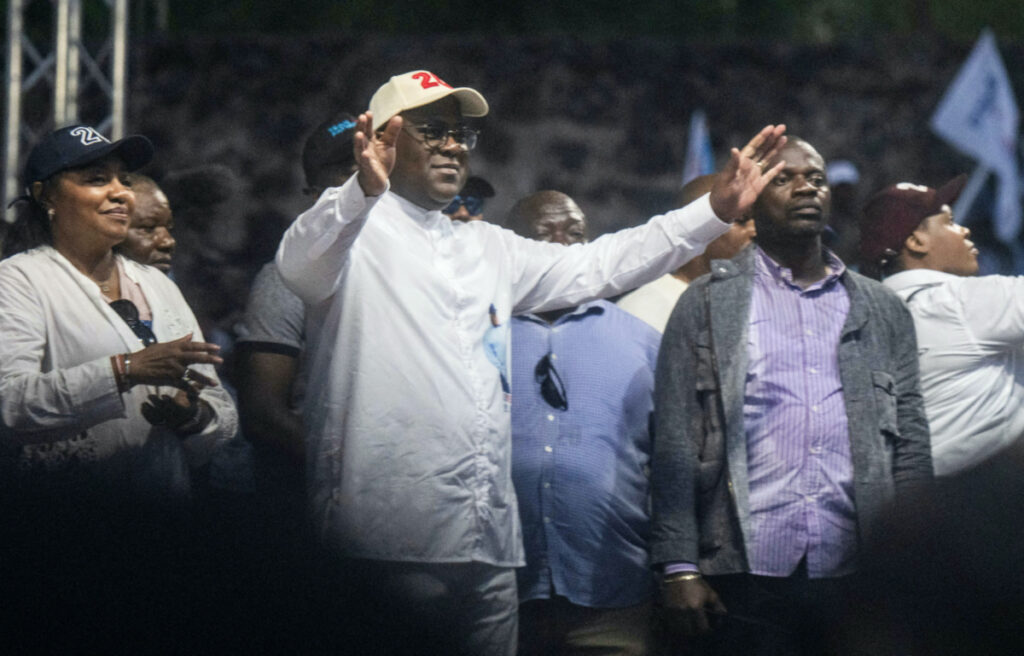Democratic Republic of the Congo's President Felix Tshisekedi flanked by first lady Denise Nyakeru salute supporters during a campaign rally at the Afia stadium in Goma, North Kivu province of the Democratic Republic of Congo on 10th December, 2023