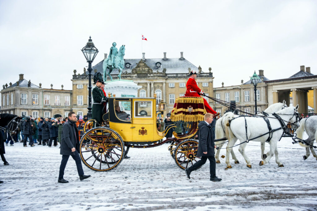 Denmark's Queen Margrethe is escorted by the Gardehusar Regiment's Horseskort in the gold carriage from Christian IX's Palace, Amalienborg to Christiansborg Palace in Copenhagen for the New Year's reception, in Denmark, on 4th January, 2024