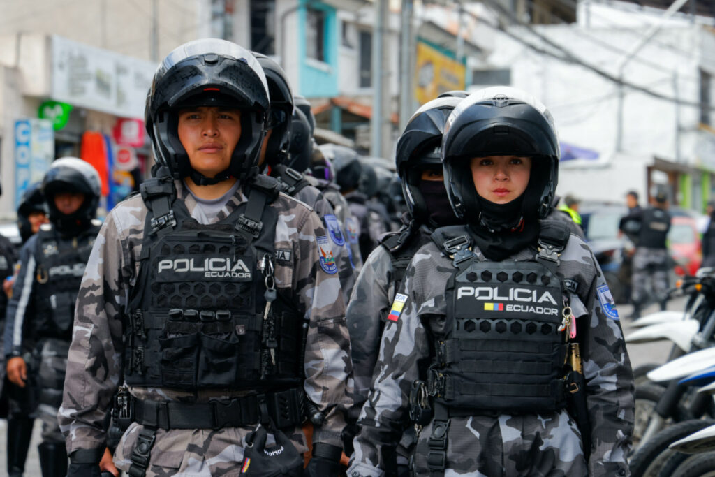 Police officers stand in formation outside El Inca prison after a security operation due to riots, following the disappearance of Jose Adolfo Macias, alias 'Fito', leader of the Los Choneros criminal group, in Quito, Ecuador, on 8th January, 2024