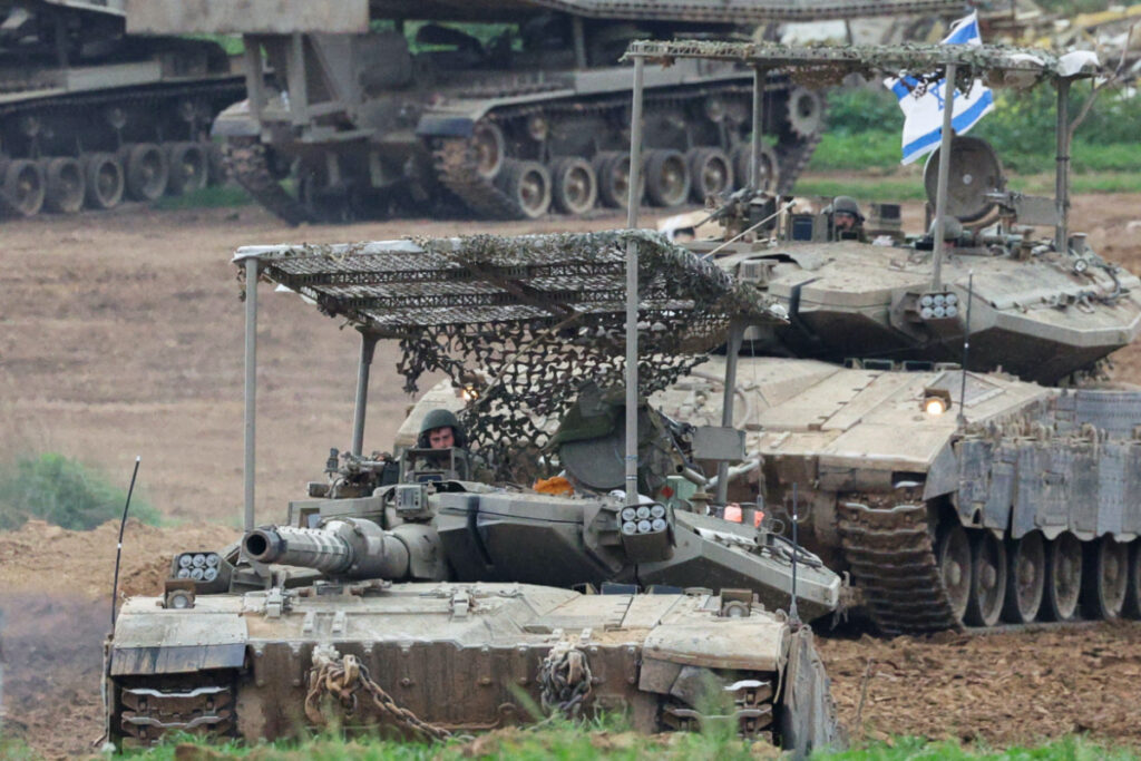 Israeli army tanks manoeuvre near the Israel-Gaza border, amid the ongoing conflict between Israel and the Palestinian Islamist group Hamas, in Israel, on 3rd January, 2024.