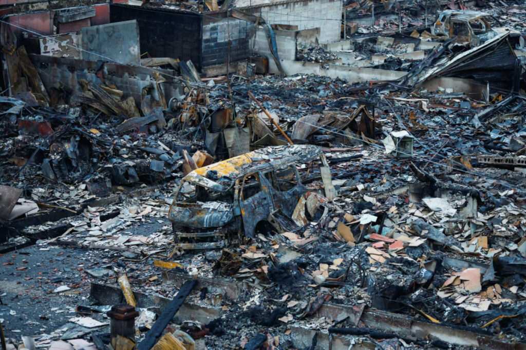 Debris accumulates along Asaichi-dori street, which burned down due to a fire following an earthquake, in Wajima, Japan, on 4th January, 2024