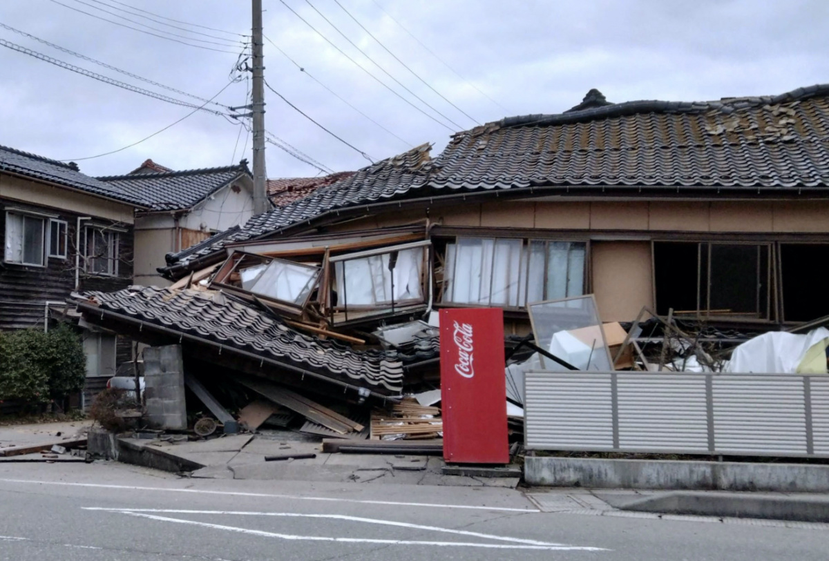 A collapsed house following an earthquake is seen in Wajima, Ishikawa prefecture, Japan, on 1st January, 2024, in this photo released by Kyodo.