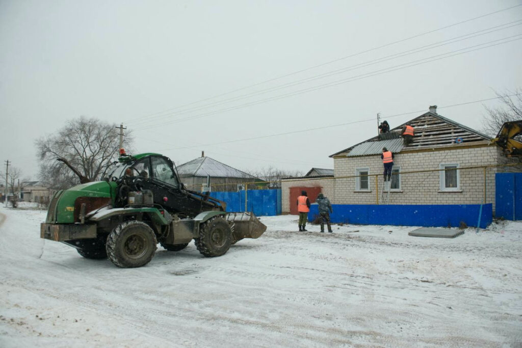Workers repair the roof of a damaged house in the village of Petropavlovka that was accidentally bombed by one of Russia's own military planes the day before, in the Voronezh Region, Russia, on 3rd January, 2024.