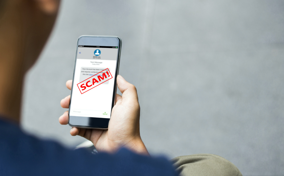 Text message SMS scam or phishing concept.