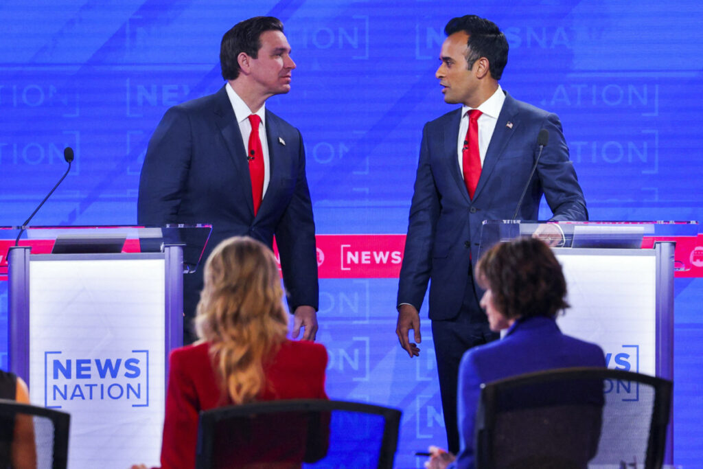 Republican presidential candidate Florida Governor Ron DeSantis and Republican presidential candidate and businessman Vivek Ramaswamy chat during a break during the fourth Republican candidates' US presidential debate of the 2024 US presidential campaign at the University of Alabama in Tuscaloosa, Alabama, US, on 6th December, 2023