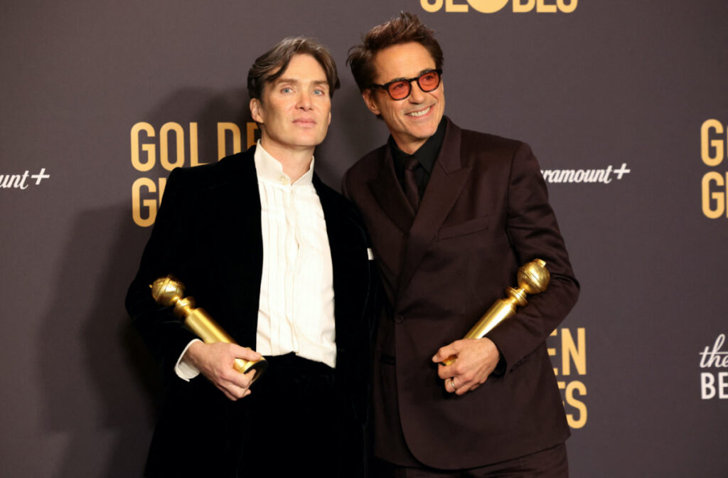 Robert Downey Jr poses with the award for Best Motion Picture - Drama for "Oppenheimer" as Cillian Murphy holds the award for Best Performance by a Male Actor in a Motion Picture for "Oppenheimer" at the 81st Annual Golden Globe Awards in Beverly Hills, California, US, on 7th January, 2024