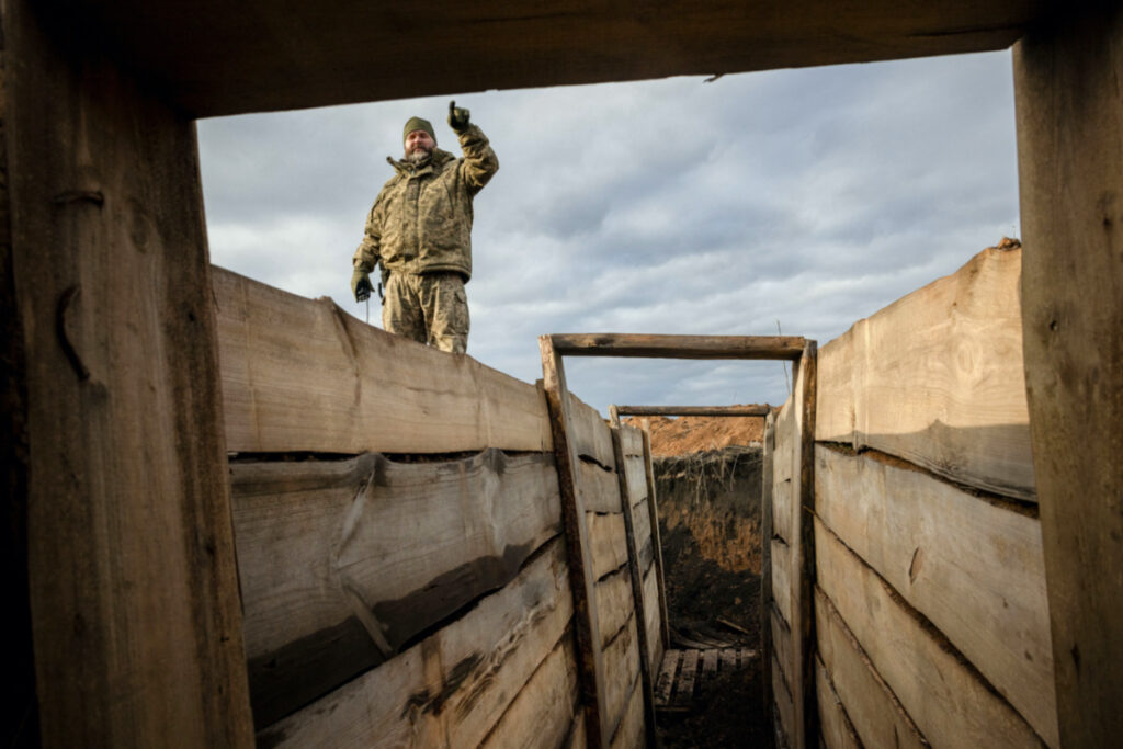 Ukrainian military engineer with the call sign "Lynx" inspects a freshly dug trench that his unit built as part of a system of new fortifications near the front lines outside Kupiansk, amid Russia’s attack on Ukraine, on 28th December, 2023