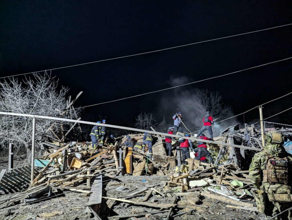 Rescuers work at the site of a Russian missile strike in an area of the Pokrovsk town, amid Russia's attack on Ukraine, in Donetsk region, Ukraine on 6th January, 2024.