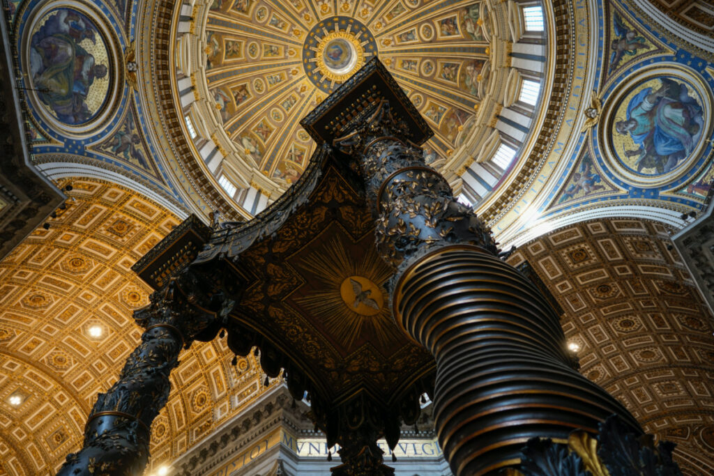 A view of the 17th century, 95ft-tall bronze canopy by Giovan Lorenzo Bernini surmounting the papal Altar of the Confession in St Peter's Basilica at the Vatican, on Wednesday, 10th January, 2024